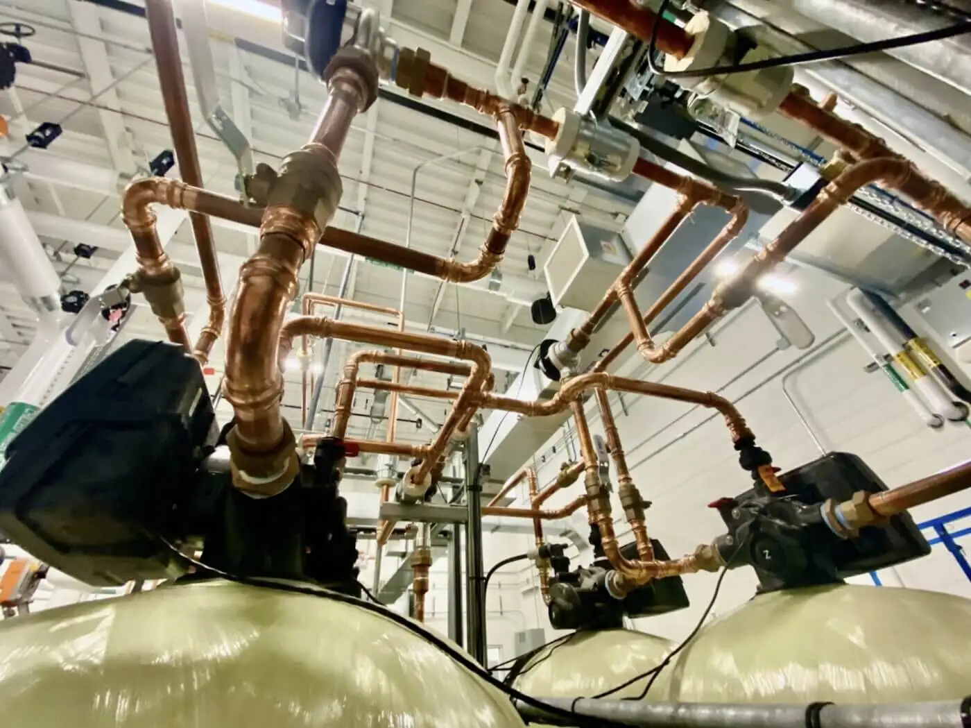 A factory with a water system featuring copper water pipes